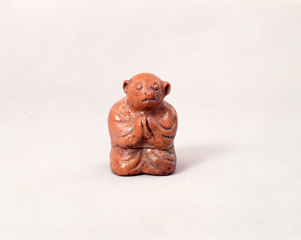 58 赤楽白蔵主香合